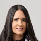 Dra. Nelvis Suárez, DMD, FACE, FAGD, FIADFE, FACDS